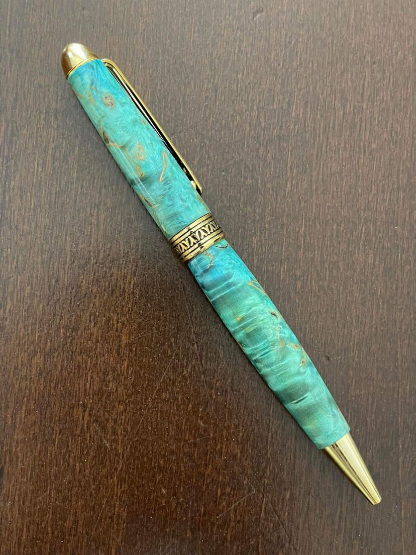 Pen made from curly birch wood